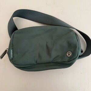 lululemon athletica dark green sling belt bag